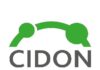 W centrum obrazu napis wielkimi literami „CIDON”, po d nim napis „W Oddziale PFRON”. Napisy są wpisane w okrąg wykonany zielona grubą linia, na której widać mniejsze, wypełnione zielenią okręgi.